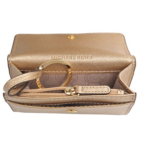 michael kors jet set travel coin purse wristlet|Michael Kors jet set airplane.